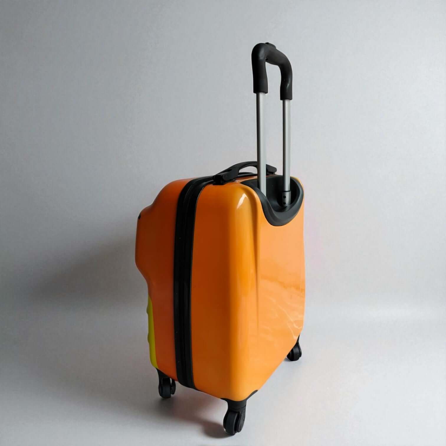 This is highly descriptive, clearly identifying the colors, the "monster character" (or dinosaur, depending on interpretation), its intended user ("kids'"), the product type ("trolley bag"), and the key selling point ("unbreakable design"). It also includes your brand name. This is excellent for specific searches. www.usmile.toys